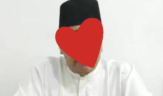 Oknum pengurus FKUB berinisial HP//Foto: Istimewa.